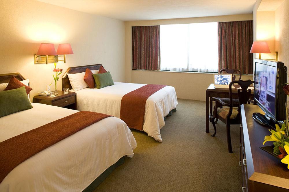 ควอลิตี้ อินน์ ปาชูกา Pachuca ภายนอก รูปภาพ A typical room at the hotel